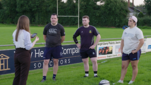 Celine Fox TCD with players and project participants at Monaghan Rugby Club