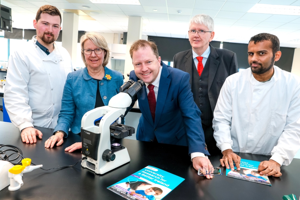 (l-r): PhD researcher Aaron Curtis, MU President Prof Eeva Leinonen, Minister James Lawless, IUA Director General Jim Miley and PhD researcher Pranay Agarwal