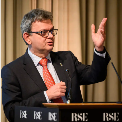 Sir Anton Muscatelli, President of the Royal Society of Edinburgh. He is speaking at a lectern and is gesturing with his hand.